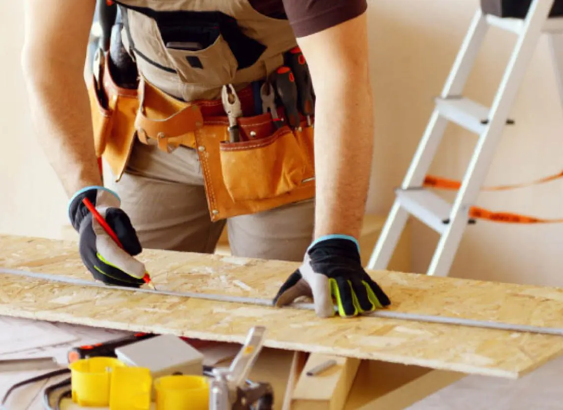 Carpenter working on house renovation
