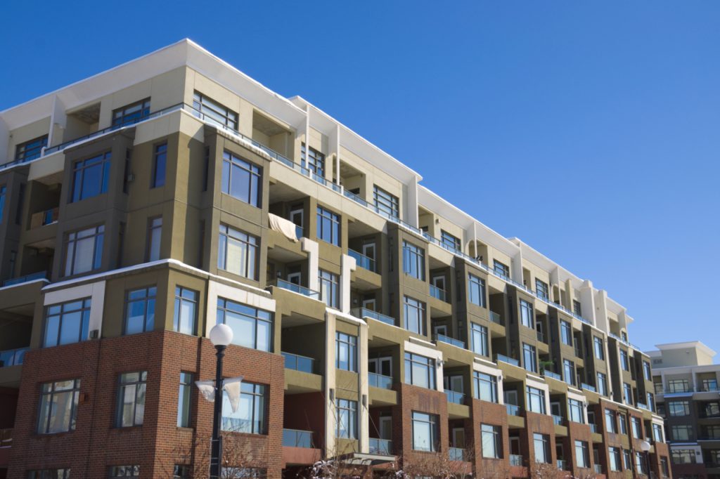 Tall apartment building in Calgary. Alberta, Canada. Residential architecture