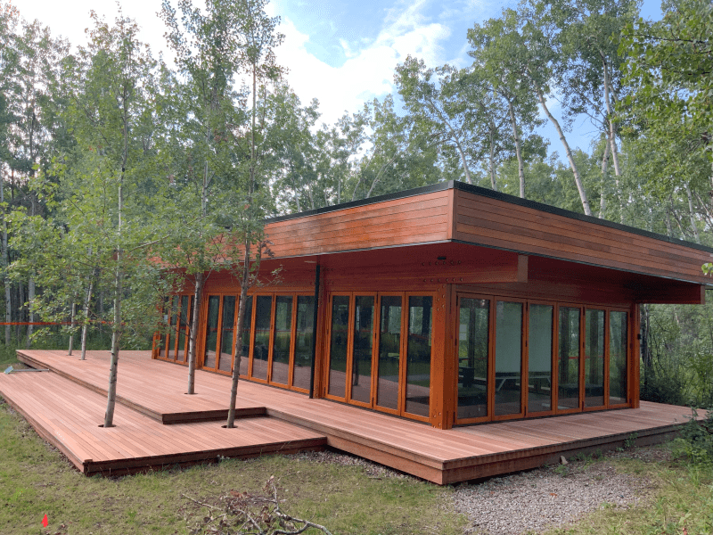 freshly stained cedar building and deck professionally stained and painted by Harding's Painting