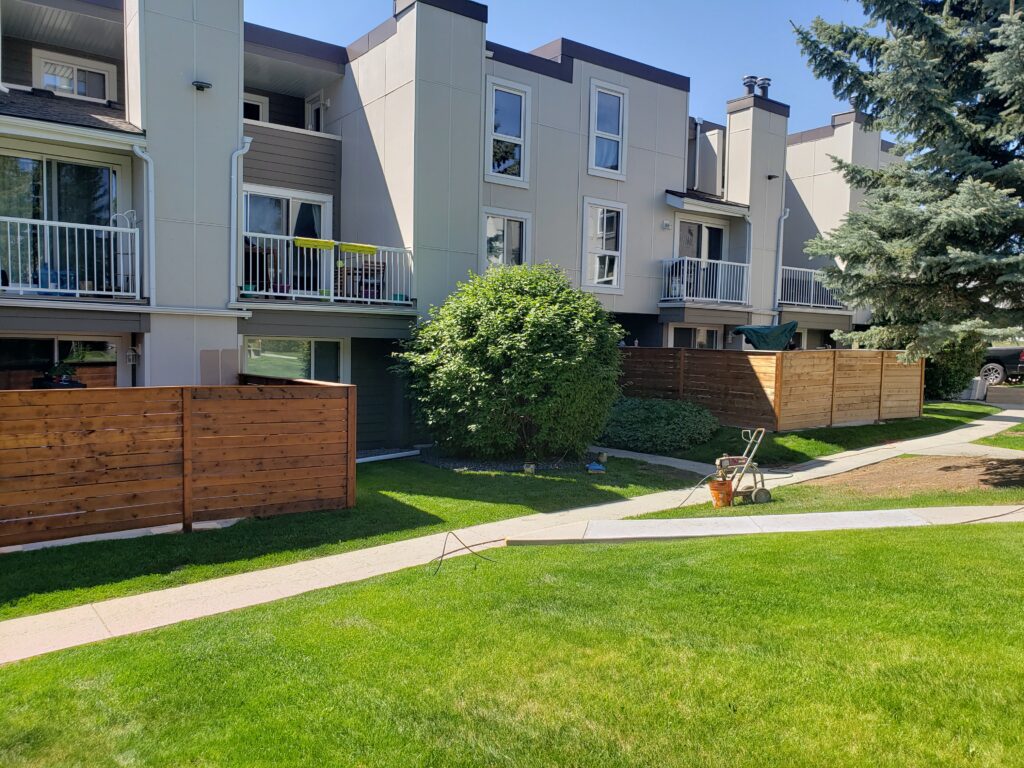 fence staining project at an older condo complex in calgary alberta