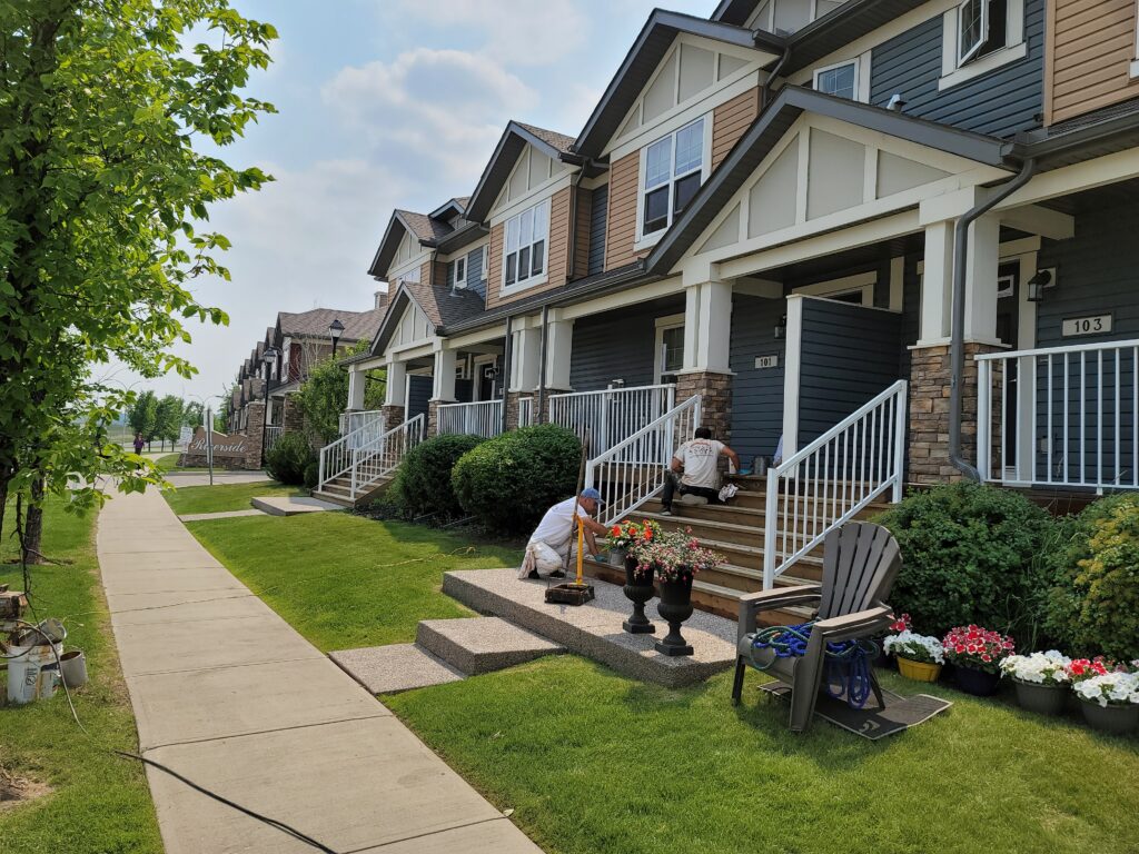 condominium building have its decks and stairs re-stained by harding's condminium painting team
